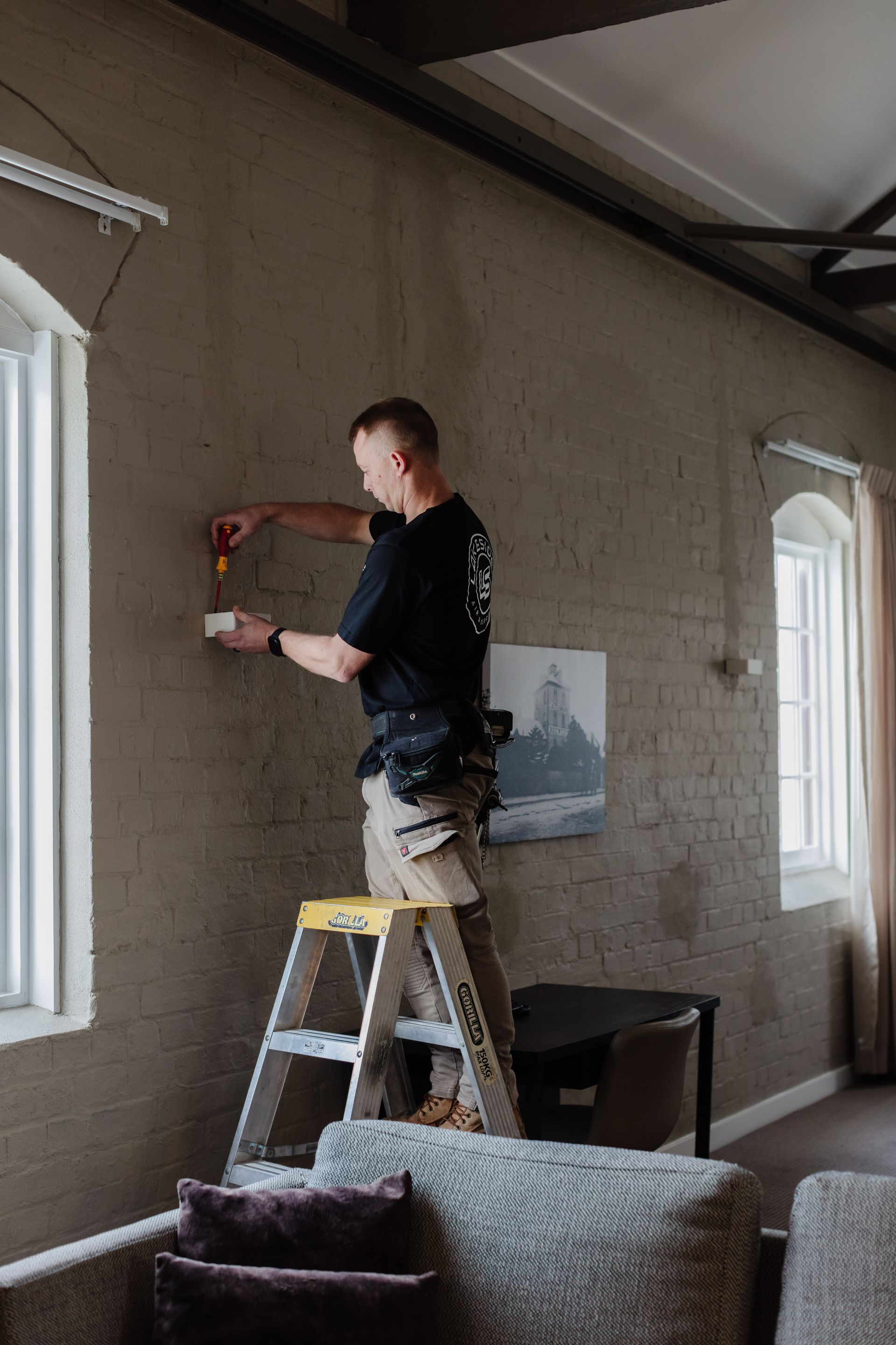 Lakeside Air & Electrical technician at work on site